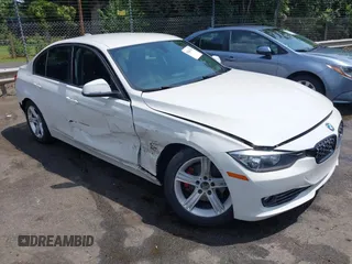 2014 BMW 3 Series 328i with VIN WBA3C1C5XEK107826, listed as a IAAI auction lot 42481701 with 104,151 mi miles and . Bid and sale history available at DreamBid. Image 1.