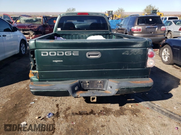 1999 Dodge Dakota SLT with VIN 1B7GG22X0XS239398, listed as a Copart auction lot 80143414 with 147,646 mi miles and Salvage Title. Bid and sale history available at DreamBid. Image 6.