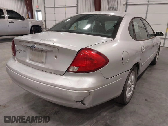 2002 Ford Taurus SES Standard with VIN 1FAFP55U42A166703, listed as a IAAI auction lot 41868369 with 178,362 mi miles. Bid and sale history available at carsss.com. Image 4.