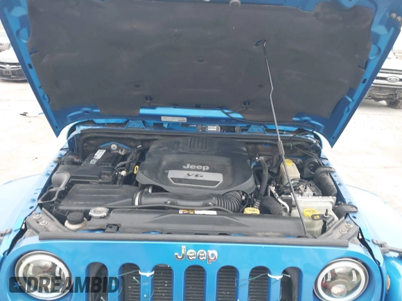 2014 Jeep Wrangler Arctic z VIN 1C4GJWBG3EL313350, wystawiony jako IAAI lot #41442520 z przebiegiem Nie podano mil oraz . Historia ofert i sprzedaży dostępna na DreamBid. Obrazek 10.