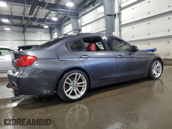 2014 BMW 3 Series 335i xDrive with VIN WBA3B9C59EP458568, listed as a Copart auction lot 61133085 with 177,009 mi miles and Salvage title. Bid and sale history available at DreamBid. Image 3.