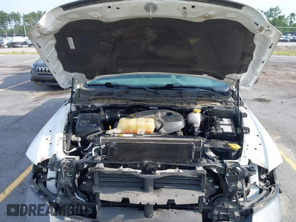 2018 Ram 1500 Tradesman with VIN 1C6RR7KM4JS297910, listed as a IAAI auction lot 42497420 with 68,480 mi miles and . Bid and sale history available at DreamBid. Image 10.