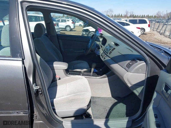 2004 Toyota Camry LE with VIN 4T1BF32K24U574956, listed as a IAAI auction lot 41801097 with 144,083 mi miles. Bid and sale history available at carsss.com. Image 5.