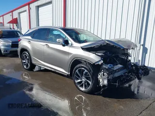 2018 Lexus RX 350 z VIN 2T2BZMCA4JC141327, wystawiony jako IAAI lot #41411407 z przebiegiem 127 420 mil mil oraz . Historia ofert i sprzedaży dostępna na DreamBid. Obrazek 1.