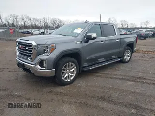 2021 GMC Sierra 1500 SLT z VIN 3GTU9DET8MG413416, wystawiony jako IAAI lot #41935465 z przebiegiem 70 547 mil mil oraz . Historia ofert i sprzedaży dostępna na DreamBid. Obrazek 18.