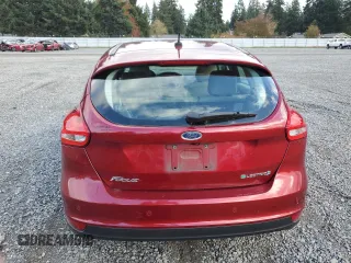 2015 Ford Focus Electric z VIN 1FADP3R40FL249156, wystawiony jako Copart lot #75577633 z przebiegiem 90 617 mil mil oraz . Historia ofert i sprzedaży dostępna na DreamBid. Obrazek 6.