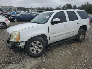 2009 GMC Yukon SLT w/4SB with VIN 1GKFC33059R161309, listed as a Copart auction lot 88947235 with 225,317 mi miles and Salvage Title. Bid and sale history available at carsss.com. Image 1.