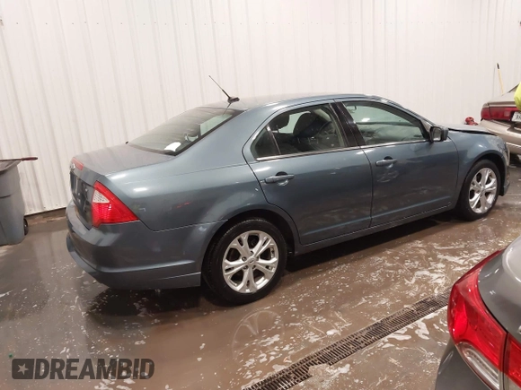 2012 Ford Fusion SE with VIN 3FAHP0HA8CR415136, listed as a IAAI auction lot 41923058 with 192,328 mi miles. Bid and sale history available at carsss.com. Image 4.