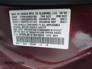 2007 Honda Odyssey EX-L z VIN 5FNRL387X7B416523, wystawiony jako IAAI lot #42245359 z przebiegiem 224 645 mil mil oraz . Historia ofert i sprzedaży dostępna na DreamBid. Obrazek 9.