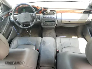 2005 Cadillac DeVille z VIN 1G6KD54Y65U205965, wystawiony jako Copart lot #58630405 z przebiegiem 129 448 mil mil oraz Czysty tytuł • Clean title. Historia ofert i sprzedaży dostępna na DreamBid. Obrazek 8.