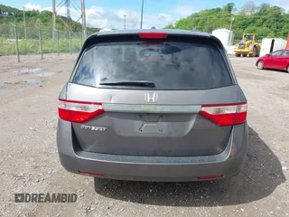 2012 Honda Odyssey EX-L with VIN 5FNRL5H68CB060487, listed as a IAAI auction lot 42176223 with 234,078 mi miles and . Bid and sale history available at DreamBid. Image 17.