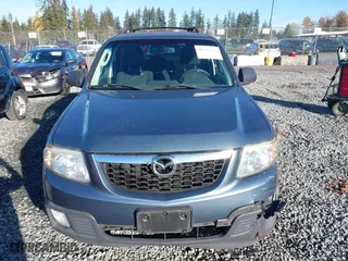 2010 Mazda Tribute Touring with VIN 4F2CY9C73AKM04595, listed as a IAAI auction lot 40797681 with 122,774 mi miles. Bid and sale history available at carsss.com. Image 12.