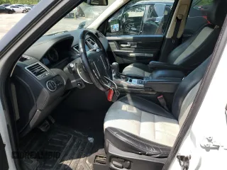 2013 Land Rover Range Rover Sport SC z VIN SALSH2E40DA778879, wystawiony jako Copart lot #59311415 z przebiegiem 132 111 mil mil oraz Tytuł czysty. Historia ofert i sprzedaży dostępna na DreamBid. Obrazek 7.