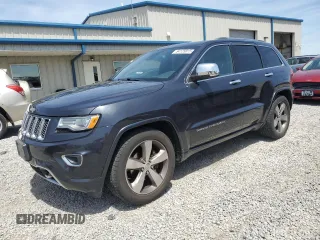 2016 Jeep Grand Cherokee Overland with VIN 1C4RJFCG9GC338165, listed as a Copart auction lot 54125815 with 102,302 mi miles and Salvage title. Bid and sale history available at DreamBid. Image 1.