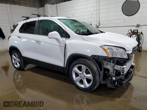 2016 Chevrolet Trax LTZ with VIN KL7CJRSB2GB525473, listed as a Copart auction lot 46880995 with 102,453 mi miles and Salvage Title. Bid and sale history available at carsss.com. Image 4.