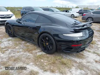 2014 Porsche 911 Turbo S with VIN WP0AD2A99ES167048, listed as a IAAI auction lot 40643041 with Not Provided miles. Bid and sale history available at carsss.com. Image 3.