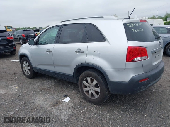 2011 Kia Sorento LX with VIN 5XYKTDA12BG059031, listed as a IAAI auction lot 42194720 with 220,000 mi miles. Bid and sale history available at carsss.com. Image 3.