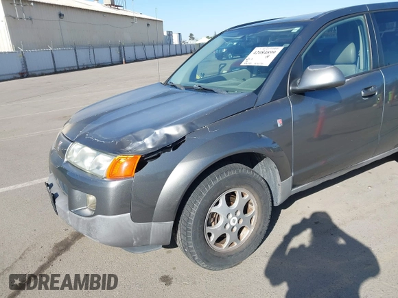 2005 Saturn VUE with VIN 5GZCZ534X5S857015, listed as a IAAI auction lot 42084899 with 196,732 mi miles. Bid and sale history available at carsss.com. Image 12.
