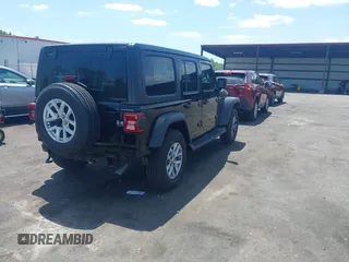 2023 Jeep Wrangler Sport S with VIN 1C4HJXDN5PW671167, listed as a IAAI auction lot 42176127 with 1,230 mi miles and . Bid and sale history available at DreamBid. Image 4.