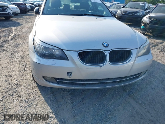 2009 BMW 5 Series 528i with VIN WBANU53569C122711, listed as a IAAI auction lot 42082909 with 157,581 mi miles and . Bid and sale history available at carsss.com. Image 6.
