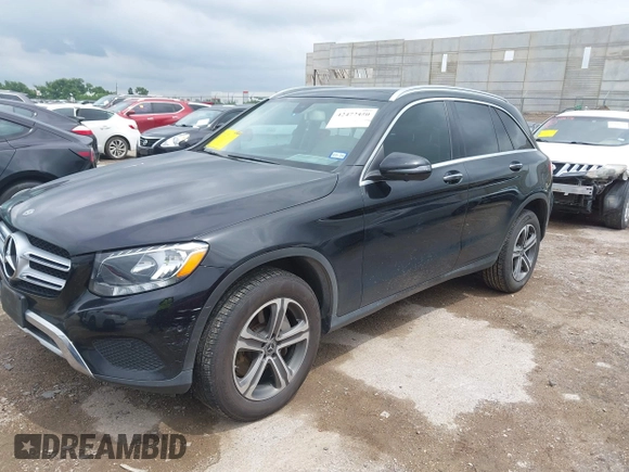 2019 Mercedes-Benz GLC 300 with VIN WDC0G4JB6KV185786, listed as a IAAI auction lot 42472450 with 86,561 mi miles and . Bid and sale history available at DreamBid. Image 2.