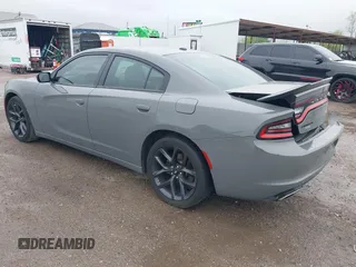 2019 Dodge Charger SXT with VIN 2C3CDXBG7KH554272, listed as a IAAI auction lot 41964492 with 126,174 mi miles. Bid and sale history available at carsss.com. Image 3.