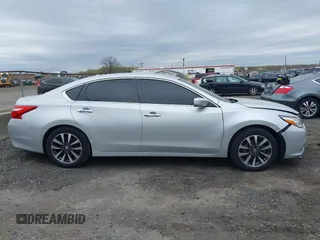 2017 Nissan Altima SR with VIN 1N4AL3AP6HC220784, listed as a IAAI auction lot 42085597 with 80,589 mi miles and . Bid and sale history available at DreamBid. Image 13.
