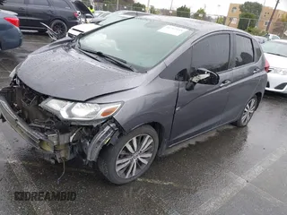 2015 Honda Fit EX-L z VIN 3HGGK5H89FM774299, wystawiony jako IAAI lot #41793448 z przebiegiem 142 228 mil mil oraz . Historia ofert i sprzedaży dostępna na DreamBid. Obrazek 2.