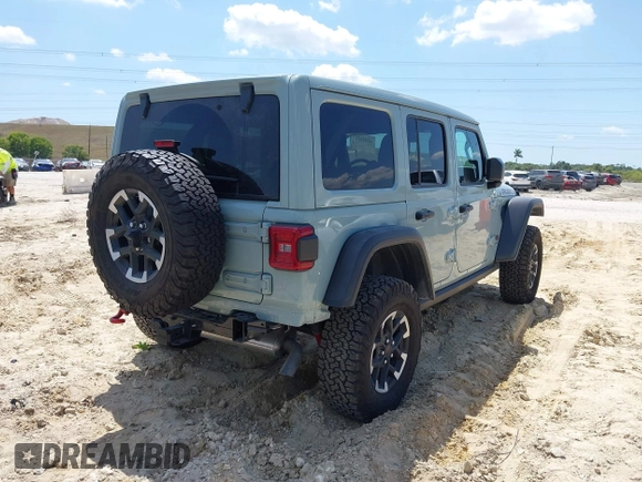 2024 Jeep Wrangler Rubicon with VIN 1C4PJXFG3RW295565, listed as a IAAI auction lot 42026211 with 5,661 mi miles. Bid and sale history available at carsss.com. Image 4.