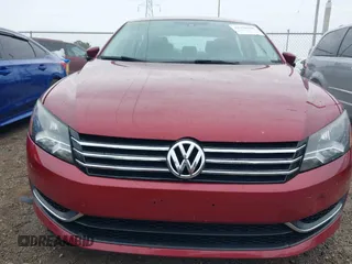 2015 Volkswagen Passat Wolfsburg Edition with VIN 1VWAT7A37FC074064, listed as a IAAI auction lot 42498108 with 183,189 mi miles and . Bid and sale history available at DreamBid. Image 12.