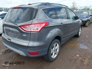 2013 Ford Escape SE with VIN 1FMCU9GX3DUD35255, listed as a IAAI auction lot 42197543 with 154,359 mi miles and . Bid and sale history available at DreamBid. Image 4.