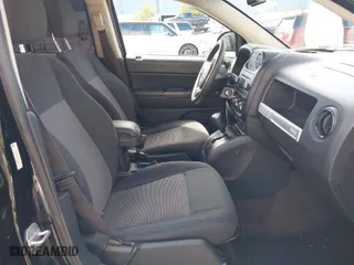 2014 Jeep Compass Sport with VIN 1C4NJCBA8ED504080, listed as a IAAI auction lot 41794638 with 82,138 mi miles. Bid and sale history available at carsss.com. Image 5.