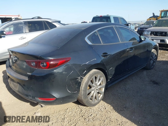 2023 Mazda 3 S Select with VIN 3MZBPABM2PM373880, listed as a IAAI auction lot 41702395 with 20,637 mi miles and . Bid and sale history available at DreamBid. Image 4.
