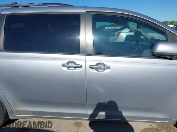 2011 Toyota Sienna XLE AAS with VIN 5TDYK3DC0BS056197, listed as a IAAI auction lot 41771073 with 195,022 mi miles and . Bid and sale history available at DreamBid. Image 12.