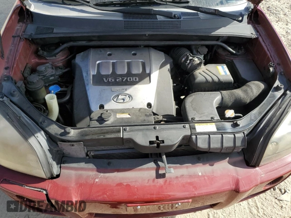 2006 Hyundai Tucson GLS with VIN KM8JN72D86U375517, listed as a Copart auction lot 77829324 with 191,899 mi miles and Salvage Title. Bid and sale history available at carsss.com. Image 12.