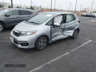 2019 Honda Fit EX with VIN 3HGGK5H87KM711969, listed as a IAAI auction lot 41812459 with 32,490 mi miles and . Bid and sale history available at DreamBid. Image 2.