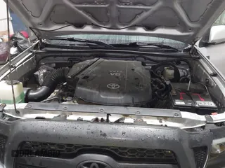 2011 Toyota Tacoma with VIN 3TMLU4EN9BM070836, listed as a IAAI auction lot 41668595 with 89,879 mi miles and . Bid and sale history available at DreamBid. Image 10.