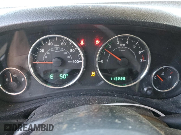2014 Jeep Wrangler Sahara with VIN 1C4AJWBG1EL168007, listed as a Copart auction lot 87331394 with 113,228 mi miles and Salvage Title. Bid and sale history available at DreamBid. Image 9.