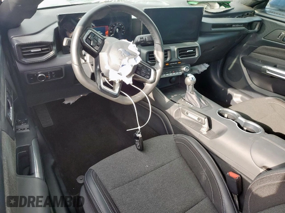 2024 Ford Mustang EcoBoost with VIN 1FA6P8TH7R5112306, listed as a Copart auction lot 58151055 with 4,467 mi miles and Salvage title. Bid and sale history available at DreamBid. Image 8.