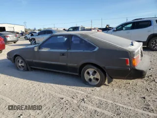 1982 Toyota Supra z VIN JT2MA67LXC0032341, wystawiony jako Copart lot #49951115 z przebiegiem 76 389 mil mil oraz Czysty tytuł • Clean title. Historia ofert i sprzedaży dostępna na DreamBid. Obrazek 2.