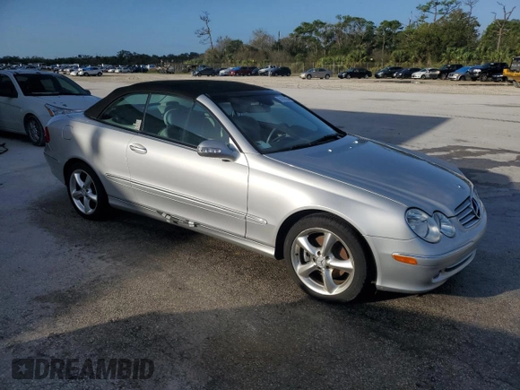 2005 Mercedes-Benz CLK-Class 3.2L with VIN WDBTK65J45F134556, listed as a Copart auction lot 74143204 with 61,131 mi miles and Salvage Title. Bid and sale history available at carsss.com. Image 4.