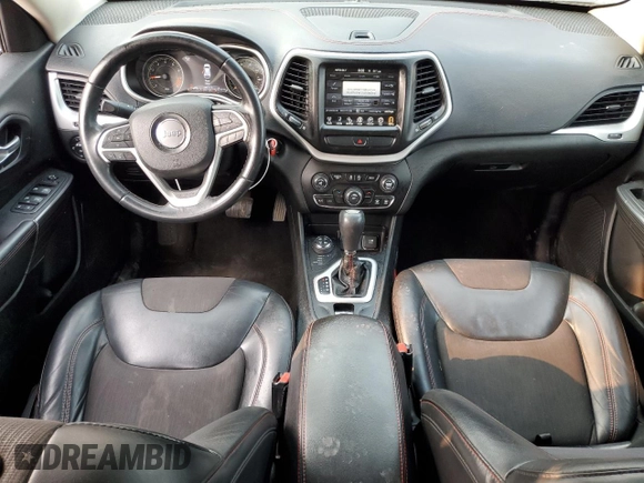 2015 Jeep Cherokee Trailhawk with VIN 1C4PJMBS0FW675807, listed as a Copart auction lot 58800615 with 109,019 mi miles and Salvage title. Bid and sale history available at DreamBid. Image 8.