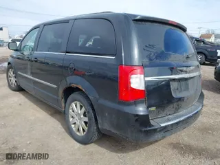 2013 Chrysler Town & Country Touring with VIN 2C4RC1BG3DR792509, listed as a IAAI auction lot 42009785 with 209,239 mi miles. Bid and sale history available at carsss.com. Image 3.