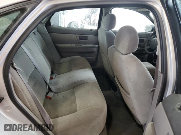 2005 Ford Taurus SE with VIN 1FAFP53215A133518, listed as a Copart auction lot 59615205 with 127,778 mi miles and Salvage title. Bid and sale history available at DreamBid. Image 10.