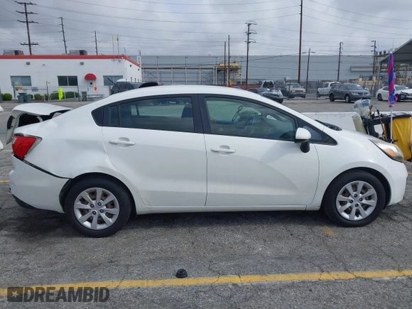 2012 Kia Rio LX with VIN KNADM4A31C6089842, listed as a IAAI auction lot 41928559 with 129,030 mi miles. Bid and sale history available at carsss.com. Image 12.