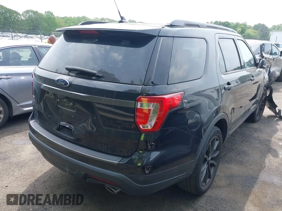 2018 Ford Explorer XLT with VIN 1FM5K7D85JGC38939, listed as a IAAI auction lot 42094891 with 122,399 mi miles and . Bid and sale history available at DreamBid. Image 4.