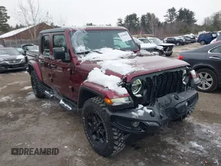 2021 Jeep Gladiator Willys with VIN 1C6HJTAG6ML571081, listed as a IAAI auction lot 41368902 with 45,077 mi miles and . Bid and sale history available at DreamBid. Image 13.