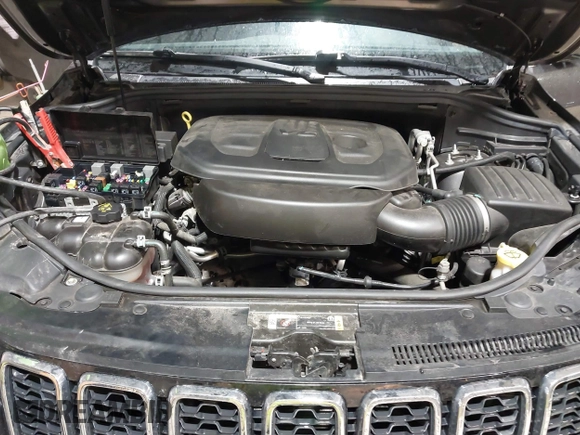 2021 Jeep Grand Cherokee Limited z VIN 1C4RJFBG7MC645198, wystawiony jako IAAI lot #41829331 z przebiegiem 62 838 mil mil oraz . Historia ofert i sprzedaży dostępna na DreamBid. Obrazek 10.