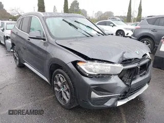 2020 BMW X1 sDrive28i with VIN WBXJG7C05L5R44276, listed as a IAAI auction lot 41567237 with 22,148 mi miles. Bid and sale history available at carsss.com. Image 1.