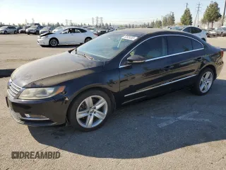 2013 Volkswagen CC Sport z VIN WVWAP7AN8DE527666, wystawiony jako Copart lot #52929385 z przebiegiem 98 661 mil mil oraz Szkody całkowita. Historia ofert i sprzedaży dostępna na DreamBid. Obrazek 1.